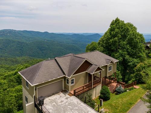 an aerial view of a house with mountains in the background at Hangin' Out in Blowing Rock