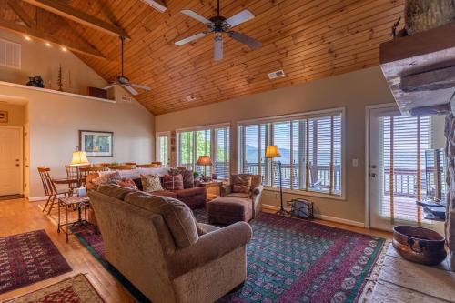 a living room with a couch and chairs and a table at Hangin' Out in Blowing Rock