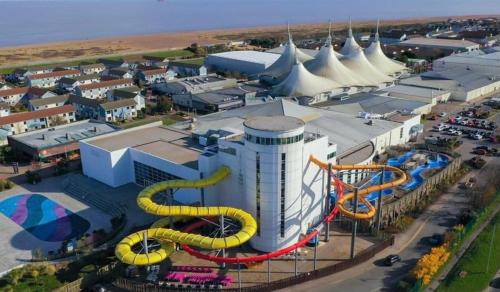 an aerial view of a water park with a roller coaster at Parkside 41 - Located on Butlins Skegness Caravan Village, WiFi - Meadow Lakes Caravan & Lodge Hire in Lincolnshire