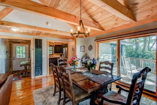 a dining room with a table and chairs at Crystal View in Valle Crucis