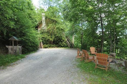 a group of benches sitting on the side of a road at St Johns Ridge in Sugar Grove