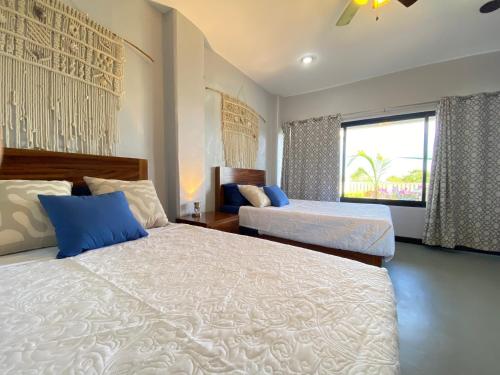 Giường trong phòng chung tại Casa Vista Del Rey