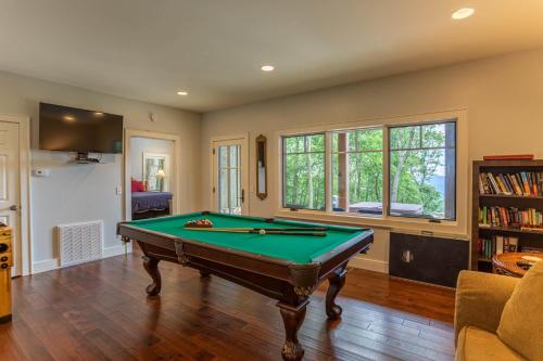 a living room with a pool table in it at Longview at Eagles Nest in Elk Park