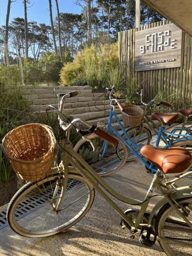 a couple of bikes parked next to each other at Casagrande Hotel & Beach Club in José Ignacio