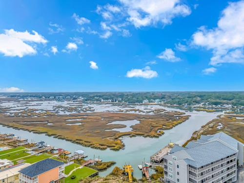 an aerial view of a river and buildings at 125 Atlantic Avenue Unit G2 -Pet Friendly! Loft Apartment -Sleeps 2-4 guests! in Myrtle Beach