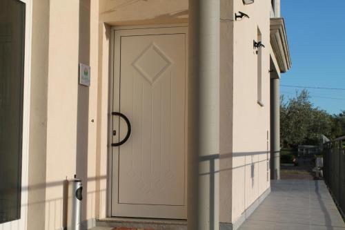 a door on the side of a building at Colline del sole in San Salvo