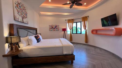 Krevet ili kreveti u jedinici u okviru objekta Sunset Island Villas Riviera Nayarit
