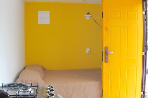 Postel nebo postele na pokoji v ubytování Cabaña en Punta del Diablo 001