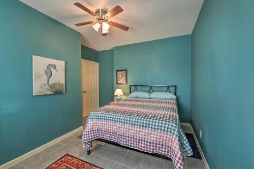 a bedroom with a bed and a ceiling fan at Serene West Cape May Getaway Walk to Beach! in Cape May