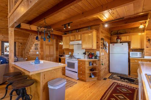 Kuchyň nebo kuchyňský kout v ubytování Timber Lodge
