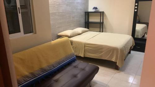 ALCOBY APARTMENTにあるベッド