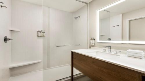 a bathroom with a sink and a shower at Staybridge Suites - Lexington S Medical Ctr Area, an IHG Hotel in Lexington