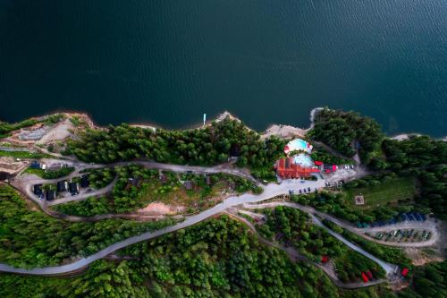 an aerial view of a park on a hill next to the water at Halcyon Hot Springs Resort in Halcyon Hot Springs