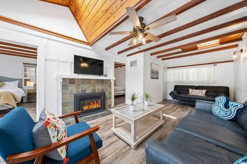 a living room with a couch and a fireplace at Charming Hillcrest/Mission Hills 3 BR + House in San Diego