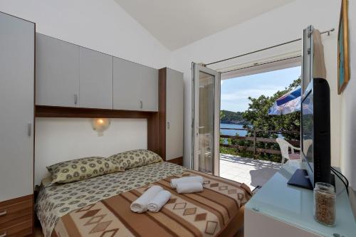Posteľ alebo postele v izbe v ubytovaní House Sea rose