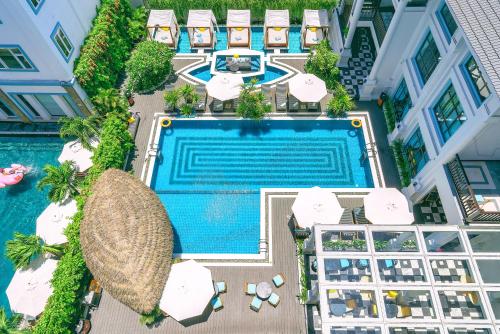 an overhead view of the pool at a resort at Anio Boutique Hotel Hoian in Hoi An