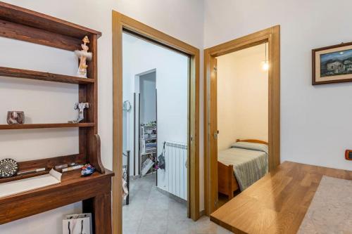 a room with a door leading to a bedroom at Appartamento indipendente ampia metratura in Santa Lucia