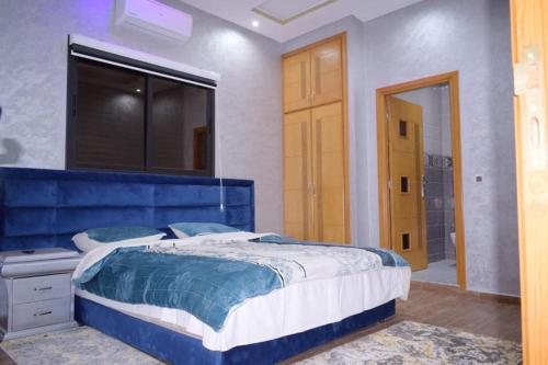 Voodi või voodid majutusasutuse Villa world Marrakech toas
