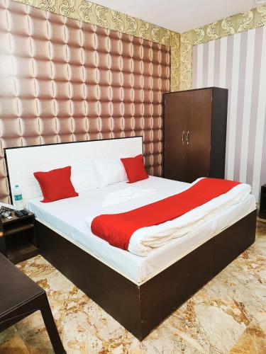 Postel nebo postele na pokoji v ubytování Hotel kingsman