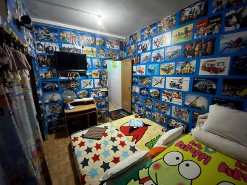 Postel nebo postele na pokoji v ubytování Pelemkecut Double-Degree Syariah Accommodation