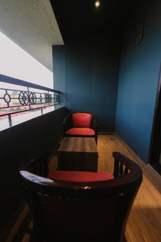 Un lugar para sentarse en Shamrock Greens by Jardin Hotels