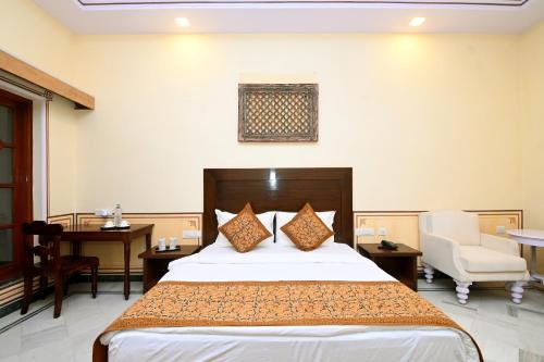 Cama o camas de una habitación en Aaram Baagh Maheshwar