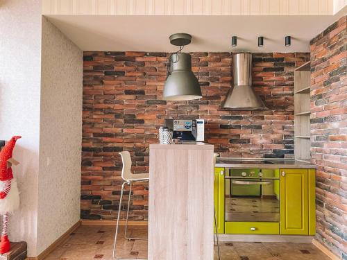 ครัวหรือมุมครัวของ Panoramic Loft Apartment