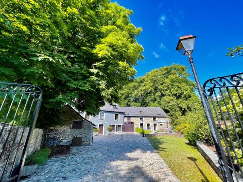 an entrance to a house with a gate at Le Marronnier in La Roche-en-Ardenne