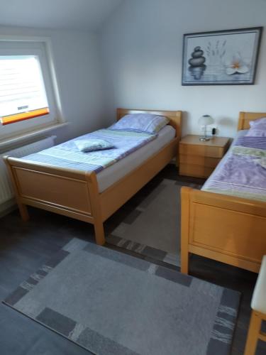 Ένα ή περισσότερα κρεβάτια σε δωμάτιο στο Apartment Hinrichs