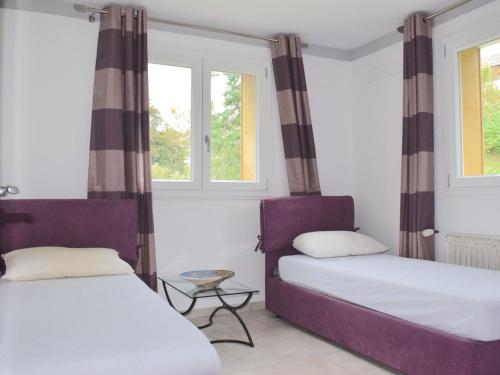 Ένα ή περισσότερα κρεβάτια σε δωμάτιο στο Grand appartement à Evian avec wifi et parking - FR-1-498-52