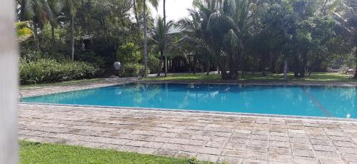 Kolam renang di atau dekat dengan The Coastal Village Cabanas