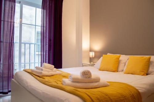 Posteľ alebo postele v izbe v ubytovaní Novam Apartament