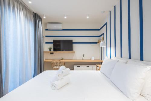 Cama o camas de una habitación en The Asprogeraka - self check-in rooms