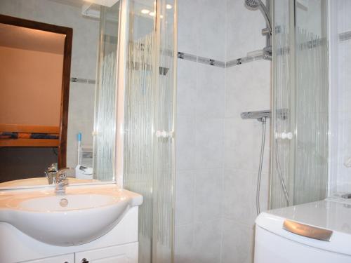 a bathroom with a sink and a shower and a toilet at Studio Bernex, 1 pièce, 4 personnes - FR-1-498-36 in Bernex