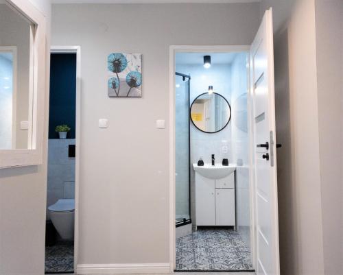 Kúpeľňa v ubytovaní Apartament Skandynawski