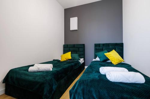 Postel nebo postele na pokoji v ubytování Panorama Capital Lily - 19 piętro