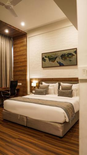 Ein Bett oder Betten in einem Zimmer der Unterkunft Hotel Centre Point