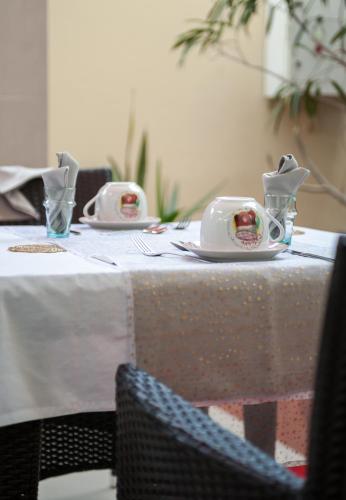 a table with two dishes on top of it at La Villa 126 Dakar in Dakar
