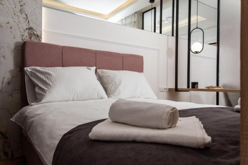 Ένα ή περισσότερα κρεβάτια σε δωμάτιο στο Apartman Dani Pale