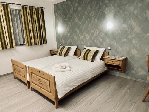 Postel nebo postele na pokoji v ubytování B&B L'Aigual