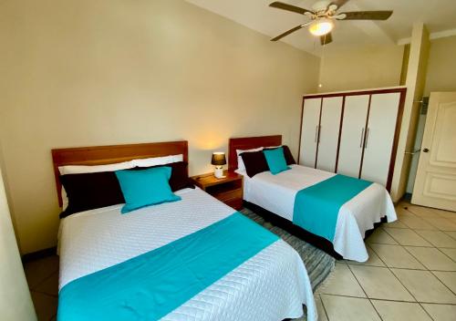 Letto o letti in una camera di Torre Mar Galapagos Boutique Suites