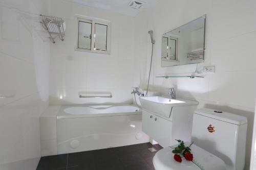 Koupelna v ubytování Guo Chen Hotel