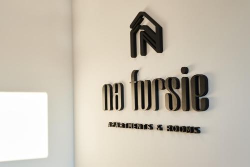 a door with the nazi logo on it at Na Fursie Apartments & Rooms in Nowy Targ