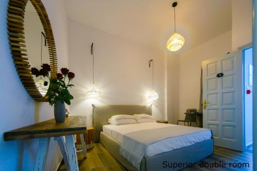 Postel nebo postele na pokoji v ubytování St. Paul's Bay View Suites