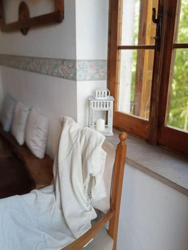 Postel nebo postele na pokoji v ubytování Casa RosaMatilda
