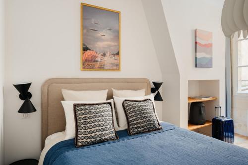 Кровать или кровати в номере Edgar Suites Bordeaux - Sainte-Catherine