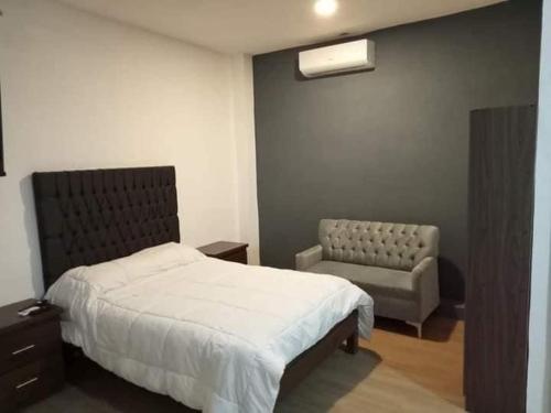 Tempat tidur dalam kamar di Loft preciosos en Heroica Matamoros