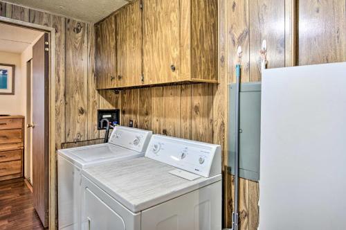 a washer and dryer in a kitchen next to a refrigerator at Lake-View Getaway in Sherrills Ford with Deck! in Denver