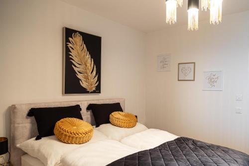 Postel nebo postele na pokoji v ubytování Ferienwohnung Deluxe Sattendorf