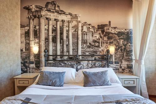 a bedroom with a wall mural of a city at Le Suite Downtown in Rome